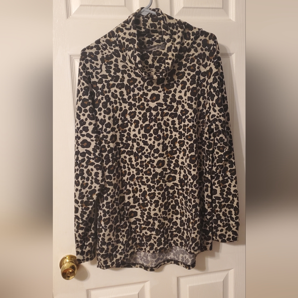 Ladies size L Animal print turtle neck long sleeve top.